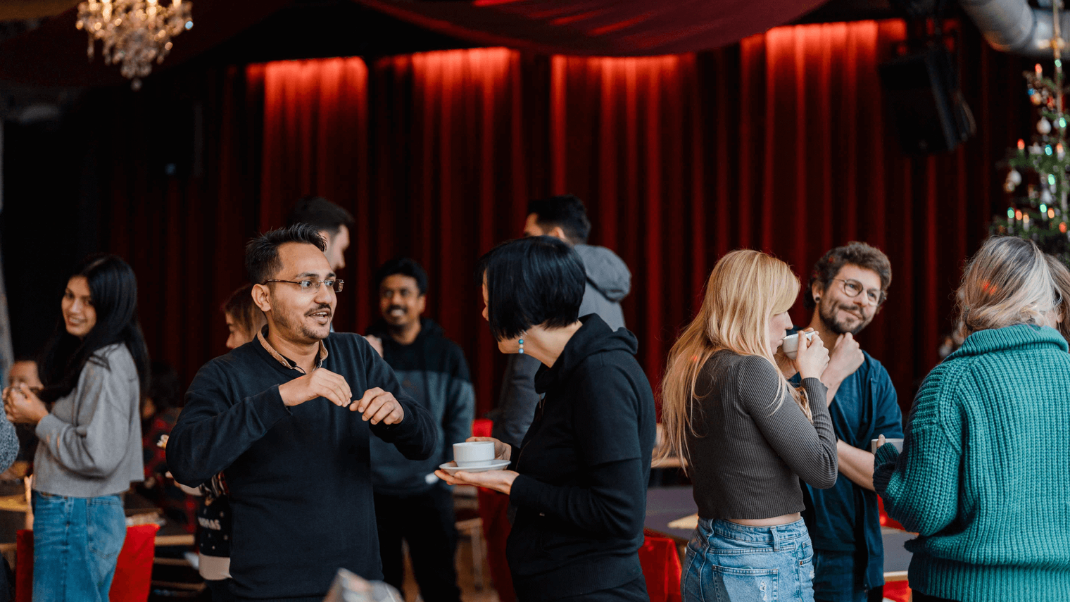 People talking during a coffee break with each other